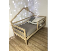 Das Bett „Haus mit Kamin“