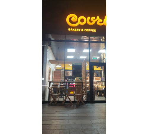 A set of wooden folding furniture (table and 2 chairs)