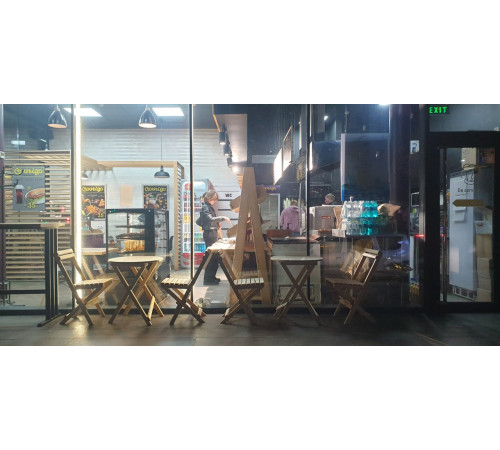 A set of wooden folding furniture (table and 2 chairs)