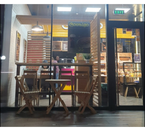 A set of wooden folding furniture (table and 2 chairs)