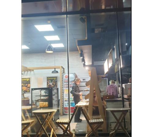 A set of wooden folding furniture (table and 2 chairs)