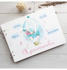Детский альбом для фото и записей в деревянной обложке с оригинальным дизайном.
