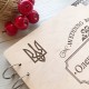 Свадебный альбом для фото и записей в деревянной обложке.