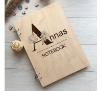 Stylish personalized notebook in a wooden cover.
