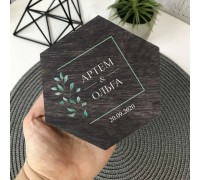 Wedding ring box with decorative moss.