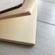 Записная книга для рецептов в деревянной обложке.