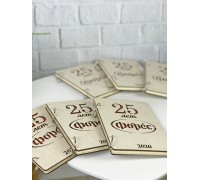 Notebook in a wooden cover with a logo.