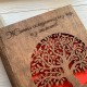 Семейный альбом в деревянной обложке для фото с индивидуальной гравировкой.