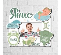 Custom-made wooden frame for a baby's photo with birth certificate and name.