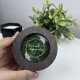 Круглая коробочка для обручального кольца со мхом и именной надписью.