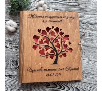 A unique gift for a wooden wedding: a family photo album