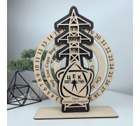 A perpetual desk calendar is an original gift for an energy specialist, a wooden calendar with a logo.