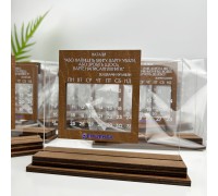 A stylish perpetual calendar with a personalized inscription for your desk is an original gift for colleagues, partners, and family.