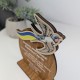 An award for kindergarten graduates, a wooden cup for children in preschool.