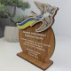 An award for kindergarten graduates, a wooden cup for children in preschool.