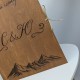 Альбом для фото в деревянной обложке с подарком на деревянную годовщину свадьбы.