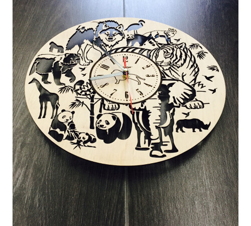 Wall clock, designer "Jungle", natural wood