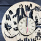 Round wall clock with a designer dial "Joker"