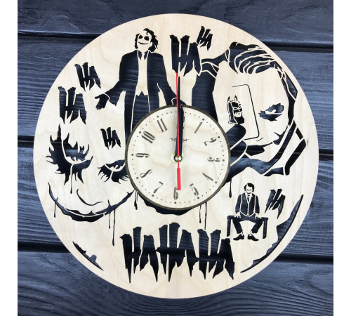 Round wall clock with a designer dial "Joker"