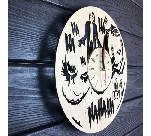 Round wall clock with a designer dial "Joker"