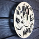 Round wall clock with a designer dial "Joker"