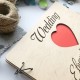 Деревянная книга для пожеланий.