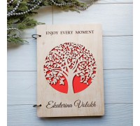 A wooden album with personalized engraving is perfect for any occasion.