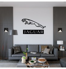 Декоративний елемент на стіні з дерева у вигляді значок Jaguar.