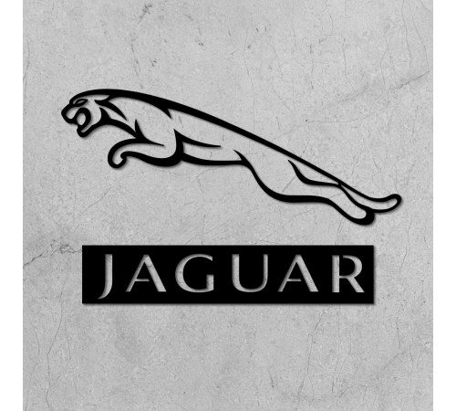 Декоративний елемент на стіні з дерева у вигляді значок Jaguar. Декоративний елемент на стіні з дерева у вигляді значок Jaguar.