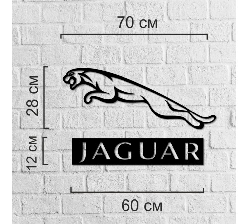 Декоративний елемент на стіні з дерева у вигляді значок Jaguar. Декоративний елемент на стіні з дерева у вигляді значок Jaguar.