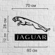 Декоративний елемент на стіні з дерева у вигляді значок Jaguar.