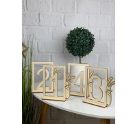 Wooden table numbers with cute rabbits.