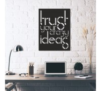 Wooden panel with trees on the wall in black.