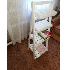 Розкладна дерев'яна поверхня.