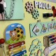 Именный развивающий бизиборд для девочки, большая доска для раннего развития ребенка 50х65 см (22 детали)