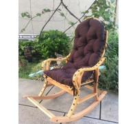 Der „zusammenklappbare“ beige Rolling Pin Chair mit braunem Kissen