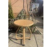 Coffee table with curved legs on wheels.