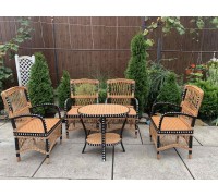 wicker chairs and table with rattan inserts