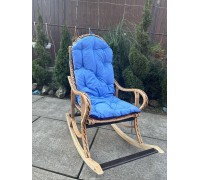 The "Collapsible No. 1" rolling pin chair with a blue cushion